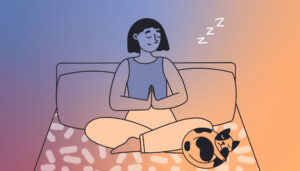 Woman meditation on bed with cat